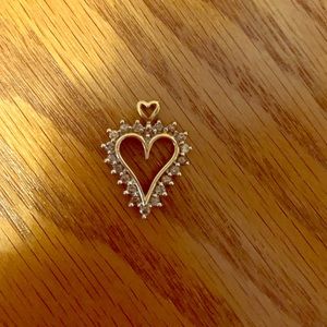 Two 14k charms with diamonds